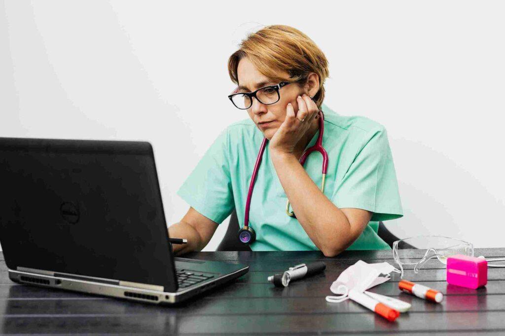 Doctor looking in screen